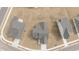 Aerial view of the rooftops of homes and driveways in the neighborhood at 366 Tormore Dr, Sanford, NC 27330