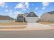 Beautiful two-story home with attached two-car garage, complementary siding, and attractive curb appeal at 366 Tormore Dr, Sanford, NC 27330