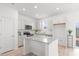 Bright kitchen featuring granite countertops, stainless steel appliances, and ample cabinet space at 366 Tormore Dr, Sanford, NC 27330