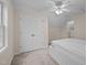 A bedroom with neutral walls, carpet, ceiling fan, closet, and en suite bathroom at 3738 Lindsey Woods Rd, Hillsborough, NC 27278