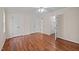 A light and spacious bedroom with multiple closets and doors to maximize the available space at 3738 Lindsey Woods Rd, Hillsborough, NC 27278