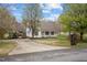 Charming home with covered porch, driveway, and carport at 3738 Lindsey Woods Rd, Hillsborough, NC 27278
