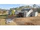 The backyard features a screened in deck and a fire pit providing an ideal outdoor entertaining and relaxation space at 40 Cinnamon Teal Way, Youngsville, NC 27596