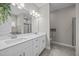 Bright bathroom featuring a double vanity sink with plenty of cabinet space at 40 Cinnamon Teal Way, Youngsville, NC 27596