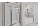 Bathroom showcases both a shower and soaking tub surrounded by tiled walls at 40 Cinnamon Teal Way, Youngsville, NC 27596