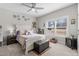 Cozy bedroom with a large bed and natural light at 40 Cinnamon Teal Way, Youngsville, NC 27596