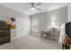 This bright bedroom features a ceiling fan, window, and closet at 40 Cinnamon Teal Way, Youngsville, NC 27596