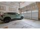 Spacious garage with vehicle, storage, and automatic door opener at 40 Cinnamon Teal Way, Youngsville, NC 27596