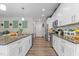 The well-appointed kitchen boasts sleek cabinetry, stainless steel appliances, and a spacious countertop at 40 Cinnamon Teal Way, Youngsville, NC 27596