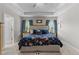 Spacious main bedroom with tray ceilings and lots of natural light at 40 Cinnamon Teal Way, Youngsville, NC 27596