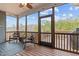 Inviting screened in porch with wooded view, great for relaxing at 40 Cinnamon Teal Way, Youngsville, NC 27596