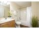 Full bathroom with tile floors, vanity with a sink, toilet, and a shower-tub combination at 407 Misty Grove Cir, Morrisville, NC 27560