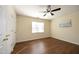 Bedroom with a large window, closet and ceiling fan with vinyl floors at 407 Misty Grove Cir, Morrisville, NC 27560
