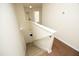 Stairwell with carpeted steps and white risers leading to the upper level at 407 Misty Grove Cir, Morrisville, NC 27560