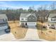 Inviting two-story home with well-maintained landscaping and two-car garage at 474 W Ravano Dr, Clayton, NC 27527