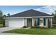 Charming single-story home featuring a well-maintained lawn and a two-car garage at 48 Longdale Dr, Graham, NC 27253
