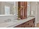 Bathroom featuring double sinks with an elegant orchid and quartz countertop at 5040 Shakori Trl, Chapel Hill, NC 27707