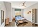 Stylish bedroom with modern decor, window, wooden floors and accents, and plenty of storage at 5040 Shakori Trl, Chapel Hill, NC 27707