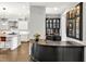 A gourmet kitchen with a sleek bar area, custom cabinets, and open design concept at 5040 Shakori Trl, Chapel Hill, NC 27707