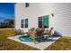 Outdoor patio area with a seating area and view to the yard at 505 Marthas View Way, Wake Forest, NC 27587