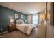 Stylishly decorated bedroom with queen size bed, bedside tables, and natural light at 505 Marthas View Way, Wake Forest, NC 27587
