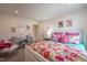 Bright bedroom featuring stylish decor and a large window, creating an inviting atmosphere at 505 Marthas View Way, Wake Forest, NC 27587
