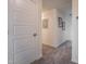 Upstairs hallway with white walls, carpet, and neutral decor for a clean and modern feel at 505 Marthas View Way, Wake Forest, NC 27587