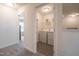 Hallway view of Laundry room with appliances and stylish patterned flooring at 505 Marthas View Way, Wake Forest, NC 27587