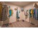 Spacious walk-in closet with carpeted floors and shelving providing ample storage space at 505 Marthas View Way, Wake Forest, NC 27587