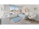 bedroom featuring natural light, wood bed frame, and a cozy rocking chair at 509 Marthas View Way, Wake Forest, NC 27587