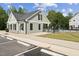 A pool house with exterior stone and siding at 509 Marthas View Way, Wake Forest, NC 27587