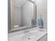 Bathroom featuring a white marble vanity top, a modern faucet and towel rack at 510 Mariah Towns Way, Garner, NC 27529