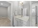 Well-lit bathroom featuring a large sink and modern finishes at 510 Mariah Towns Way, Garner, NC 27529