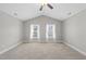 Spacious bedroom featuring vaulted ceiling and two large windows at 510 Mariah Towns Way, Garner, NC 27529