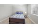 Comfortable bedroom with a large window offering natural light at 510 Mariah Towns Way, Garner, NC 27529
