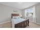 Comfortable bedroom with a large window offering natural light at 510 Mariah Towns Way, Garner, NC 27529