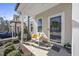 Inviting front porch with seating area and decorative accents, adding a touch of warmth and curb appeal at 510 Mariah Towns Way, Garner, NC 27529