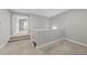 Well-lit hallway with neutral carpet and an open, airy feel at 510 Mariah Towns Way, Garner, NC 27529