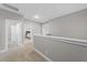 Neutral hallway that shows an open floor plan and spacious area at 510 Mariah Towns Way, Garner, NC 27529