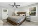 Primary bedroom featuring a ceiling fan, and neutral decor with a queen-sized bed at 5613 Ashton Dr, Raleigh, NC 27612