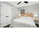 Bedroom featuring hard wood floors, ceiling fan, and natural light at 5613 Ashton Dr, Raleigh, NC 27612
