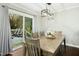 Dining room leads to an outdoor deck through sliding glass doors at 5613 Ashton Dr, Raleigh, NC 27612