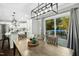 Dining area adjacent to kitchen features sliding glass doors to deck at 5613 Ashton Dr, Raleigh, NC 27612