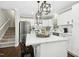 Kitchen features a large island with pendant lights and stainless steel appliances at 5613 Ashton Dr, Raleigh, NC 27612