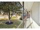 View from covered porch showcasing mature landscaping and neighborhood street at 5613 Ashton Dr, Raleigh, NC 27612