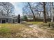 Sprawling backyard and exterior view of the home at 5819 Windham Dr, Raleigh, NC 27609