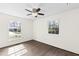 Inviting bedroom with hardwood floors, recessed lights, neutral paint, and bright windows at 5819 Windham Dr, Raleigh, NC 27609