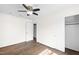 Clean bedroom with hardwood floors, recessed lights, neutral paint, and closet at 5819 Windham Dr, Raleigh, NC 27609