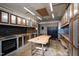 Well-lit garage area with custom workbench, tool storage, and dual access doors at 5819 Windham Dr, Raleigh, NC 27609