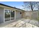 Back deck features wood lattice and sliding glass door access to the home at 5913 North Hills Dr, Raleigh, NC 27609